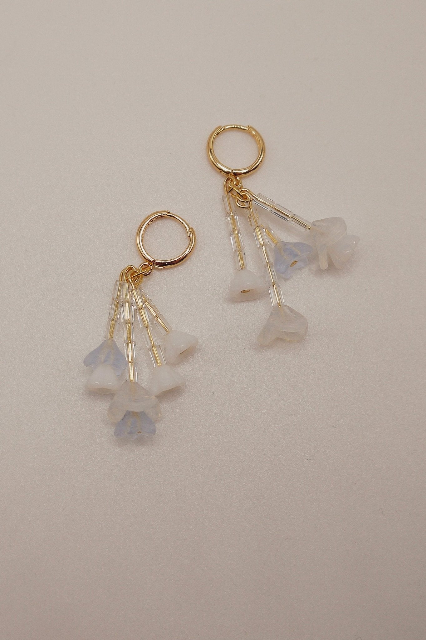 Snowdrop Earrings – gold mini hoop earrings with snowdrop inspired glass beads by Blóma