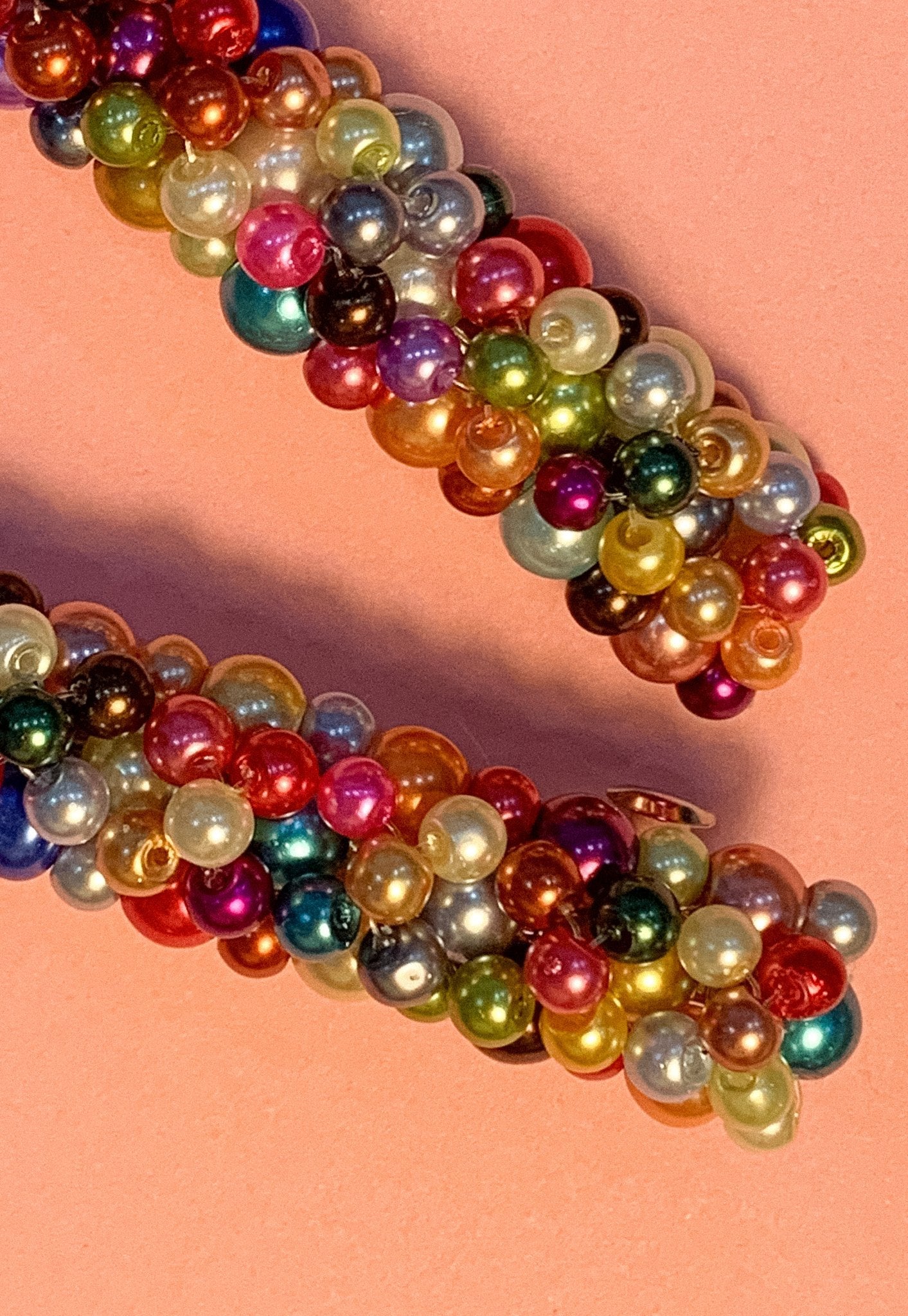 Close-up of Queenie Barrette showing glass pearl beaded design