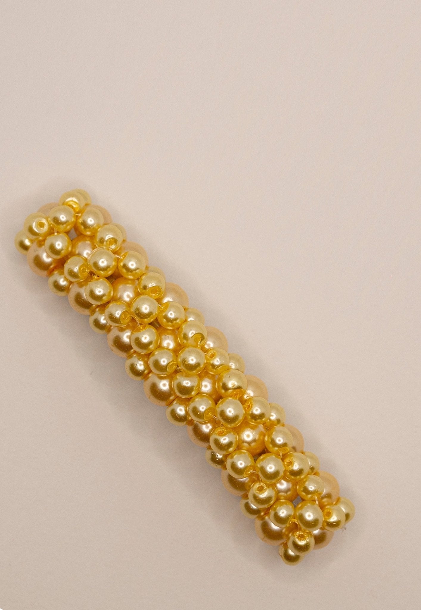 Close-up of Queenie Barrette showing glass pearl beaded design